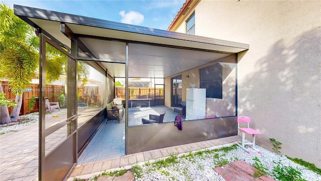 view of patio featuring fence