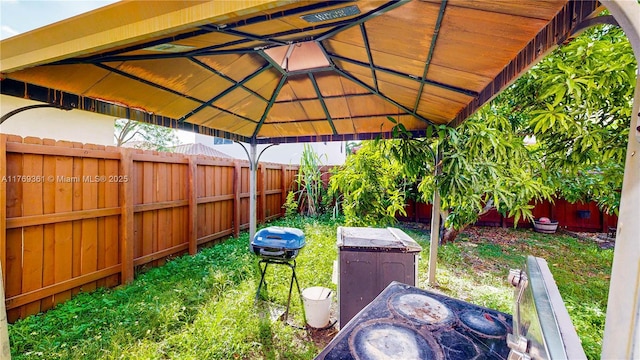 view of yard with a fenced backyard