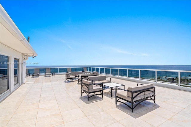 view of patio / terrace featuring an outdoor hangout area and a water view