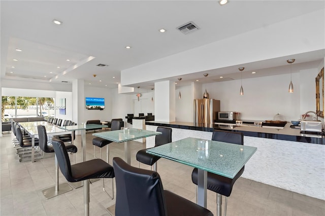 dining space featuring light tile patterned floors, visible vents, and recessed lighting