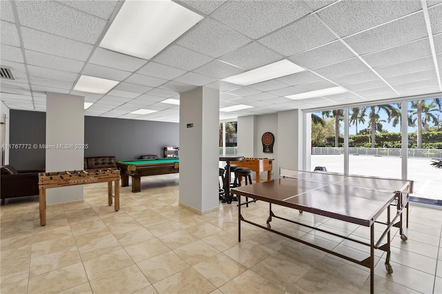 recreation room with light tile patterned floors, a drop ceiling, floor to ceiling windows, visible vents, and pool table