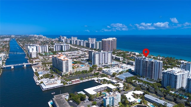 bird's eye view featuring a water view and a view of city