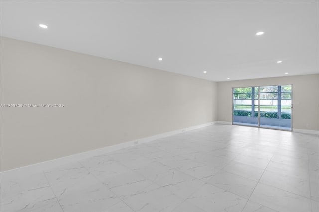 2501 Antigua Ter Unit F1, Coconut Creek, FL 33066 - unfurnished room featuring baseboards, marble finish floor, and recessed lighting