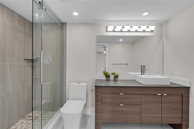 2501 Antigua Ter Unit F1, Coconut Creek, FL 33066 - bathroom with a shower stall, vanity, toilet, and recessed lighting