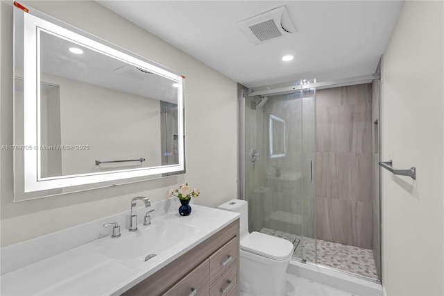 2501 Antigua Ter Unit F1, Coconut Creek, FL 33066 - bathroom with vanity, recessed lighting, toilet, a stall shower, and visible vents