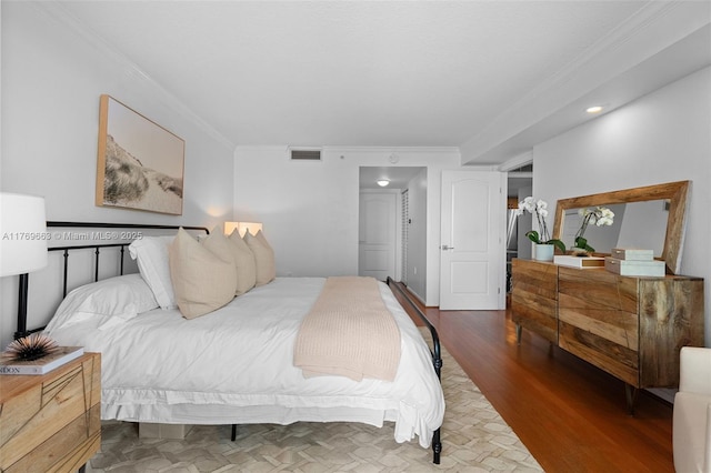 2101 Brickell Ave Unit 1809, Miami, FL 33129 - bedroom with crown molding and wood finished floors