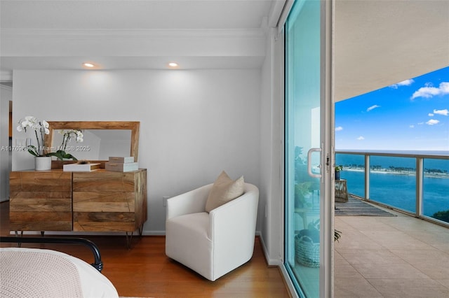 2101 Brickell Ave Unit 1809, Miami, FL 33129 - bedroom featuring crown molding, a water view, and wood finished floors