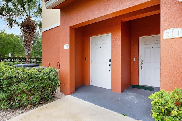 3340 Palomino Dr Unit 221-2, Davie, FL 33024 - view of exterior entry featuring stucco siding