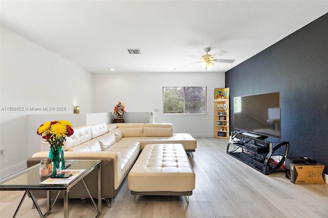 3340 Palomino Dr Unit 221-2, Davie, FL 33024 - living room with light wood-style flooring, a ceiling fan, and baseboards