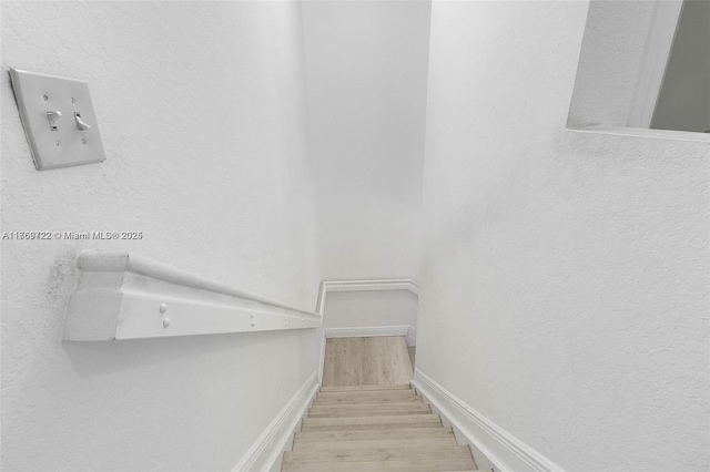 3340 Palomino Dr Unit 221-2, Davie, FL 33024 - staircase featuring wood finished floors and baseboards
