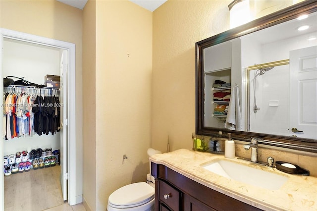 3340 Palomino Dr Unit 221-2, Davie, FL 33024 - full bath with vanity, an enclosed shower, a spacious closet, toilet, and tasteful backsplash