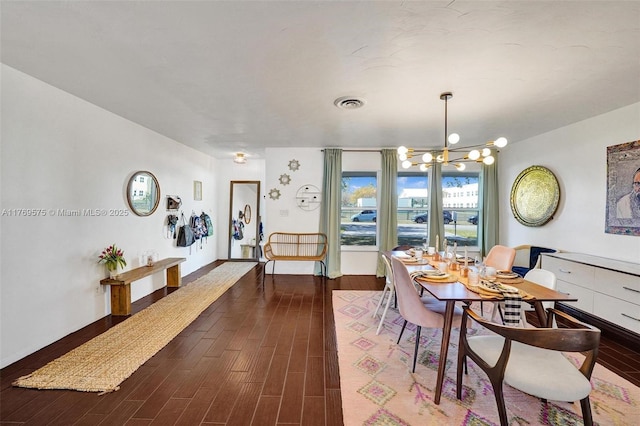 3407 N Longfellow Cir, Hollywood, FL 33021 - dining area with a chandelier and dark wood-style floors