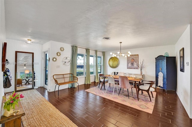 3407 N Longfellow Cir, Hollywood, FL 33021 - dining area featuring dark wood-style flooring, a chandelier, and baseboards