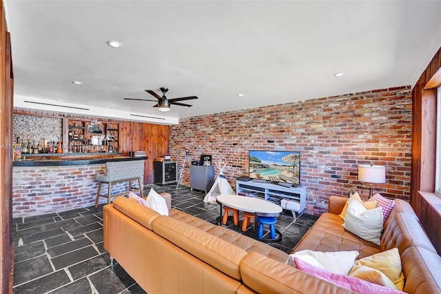 3407 N Longfellow Cir, Hollywood, FL 33021 - living area with a wood stove, a dry bar, brick wall, a ceiling fan, and recessed lighting