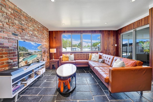 3407 N Longfellow Cir, Hollywood, FL 33021 - living room with stone tile flooring, recessed lighting, wood walls, and brick wall