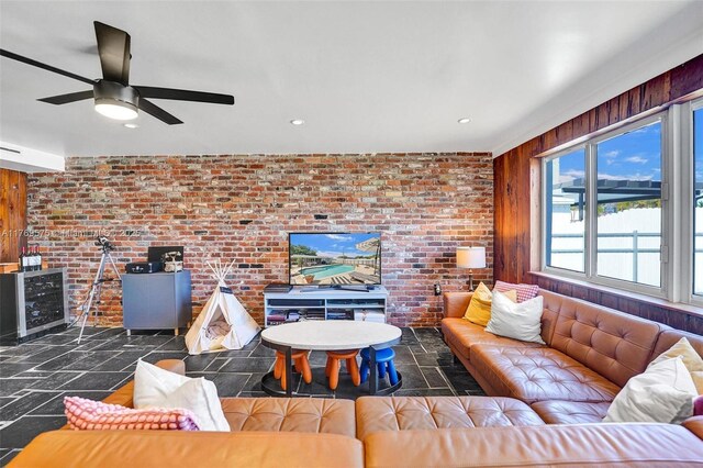 3407 N Longfellow Cir, Hollywood, FL 33021 - living area featuring beverage cooler, brick wall, ceiling fan, recessed lighting, and stone finish flooring