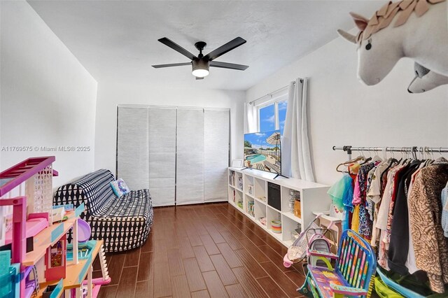3407 N Longfellow Cir, Hollywood, FL 33021 - playroom featuring a ceiling fan and dark wood finished floors