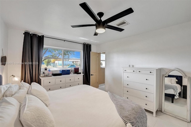 3407 N Longfellow Cir, Hollywood, FL 33021 - bedroom with light tile patterned floors and a ceiling fan