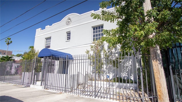 view of gate featuring fence