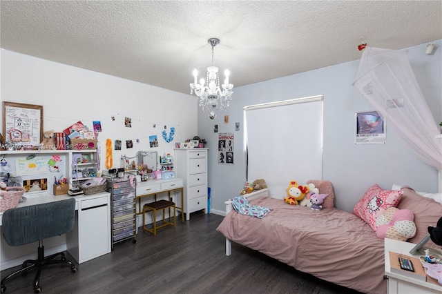 9137 Limetree Ln Unit 166, Pembroke Pines, FL 33024 - bedroom featuring dark wood-type flooring, a chandelier, a desk, and a textured ceiling