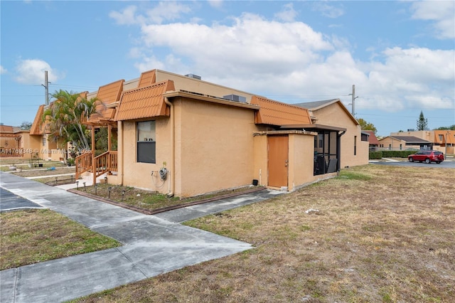9137 Limetree Ln Unit 166, Pembroke Pines, FL 33024 - view of home's exterior featuring stucco siding