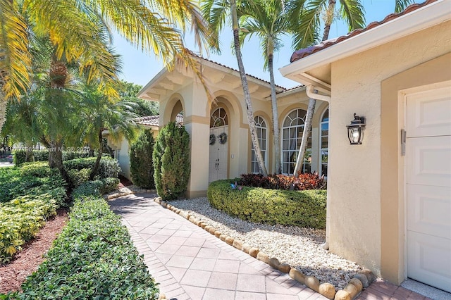 2541 Golf View Dr, Weston, FL 33327 - property entrance featuring stucco siding and a tiled roof