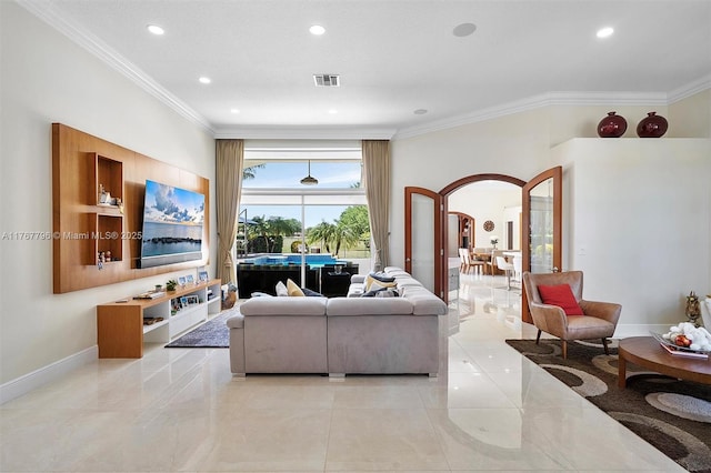 2541 Golf View Dr, Weston, FL 33327 - living area featuring arched walkways, ornamental molding, recessed lighting, and baseboards