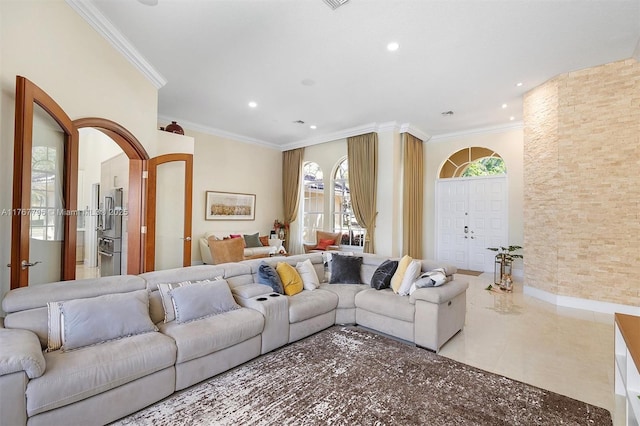 2541 Golf View Dr, Weston, FL 33327 - living area with arched walkways, recessed lighting, crown molding, and tile patterned flooring