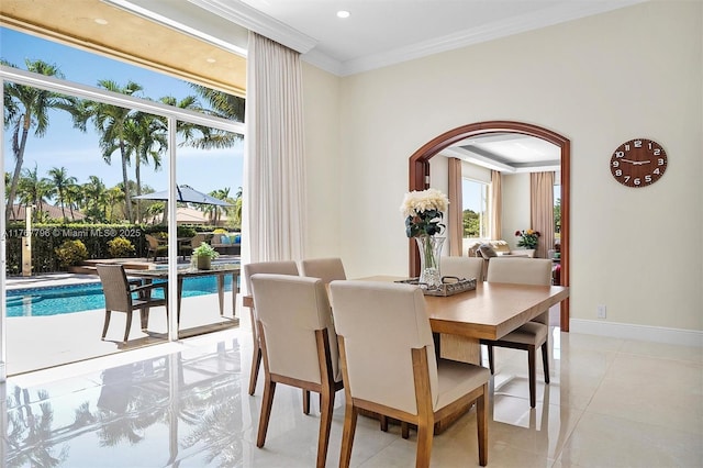 2541 Golf View Dr, Weston, FL 33327 - dining area with arched walkways, crown molding, baseboards, light tile patterned floors, and recessed lighting