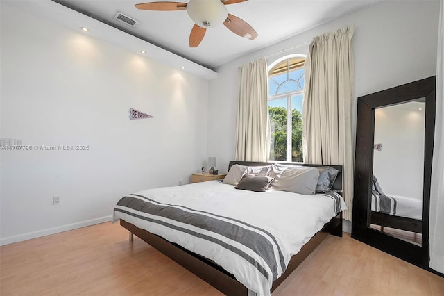 2541 Golf View Dr, Weston, FL 33327 - bedroom with light wood-type flooring, a ceiling fan, and baseboards