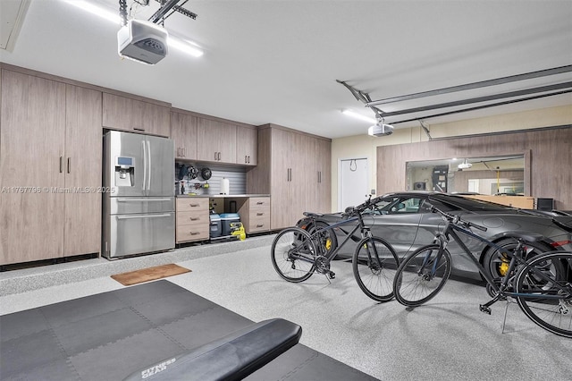 2541 Golf View Dr, Weston, FL 33327 - garage with stainless steel refrigerator with ice dispenser, a garage door opener, and wooden walls