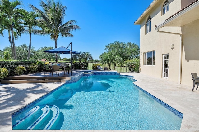 2541 Golf View Dr, Weston, FL 33327 - view of pool featuring a fenced backyard, a patio area, and a pool with connected hot tub