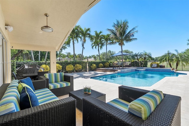 2541 Golf View Dr, Weston, FL 33327 - view of swimming pool featuring an outdoor living space, a patio area, and a fenced backyard