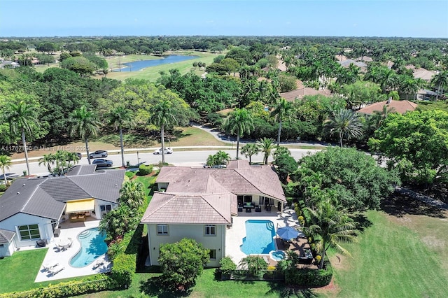 2541 Golf View Dr, Weston, FL 33327 - aerial view of residential area featuring a pool area, a large body of water, and a tree filled landscape