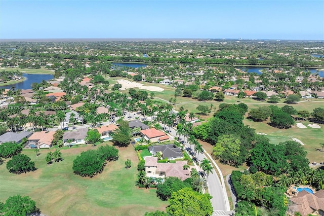 2541 Golf View Dr, Weston, FL 33327 - aerial view of property and surrounding area featuring a nearby body of water, a golf course, and nearby suburban area