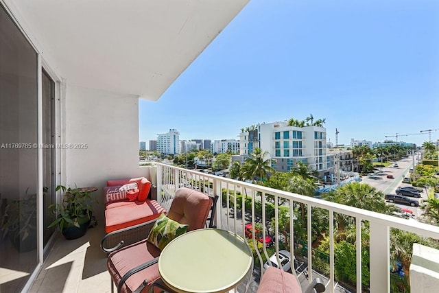 balcony featuring a view of city