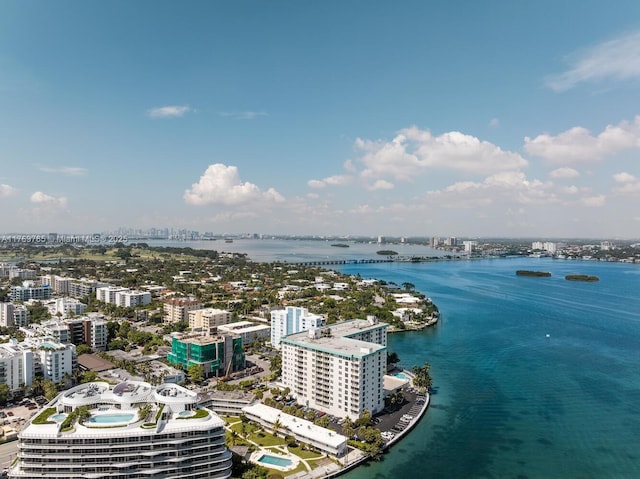 aerial view featuring a view of city and a water view