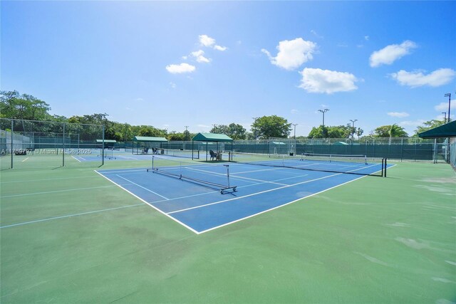4306 N Carambola Cir N, Coconut Creek, FL 33066 - view of tennis court with fence