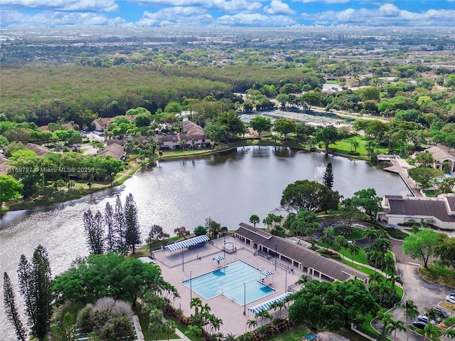 4306 N Carambola Cir N, Coconut Creek, FL 33066 - drone / aerial view of a nearby body of water and a pool area