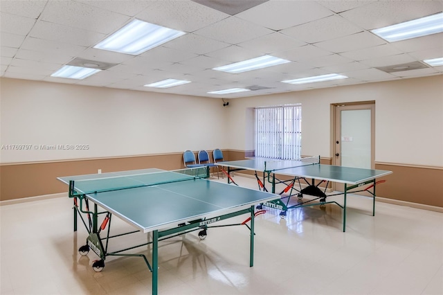 4306 N Carambola Cir N, Coconut Creek, FL 33066 - recreation room featuring a drop ceiling and baseboards