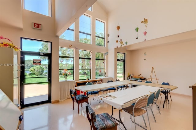 4306 N Carambola Cir N, Coconut Creek, FL 33066 - dining space featuring a high ceiling