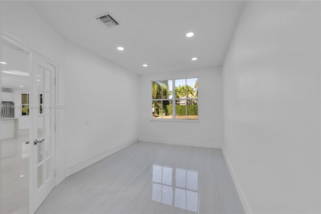 1170 Chenille Cir, Weston, FL 33327 - unfurnished room with recessed lighting, baseboards, french doors, and tile patterned flooring