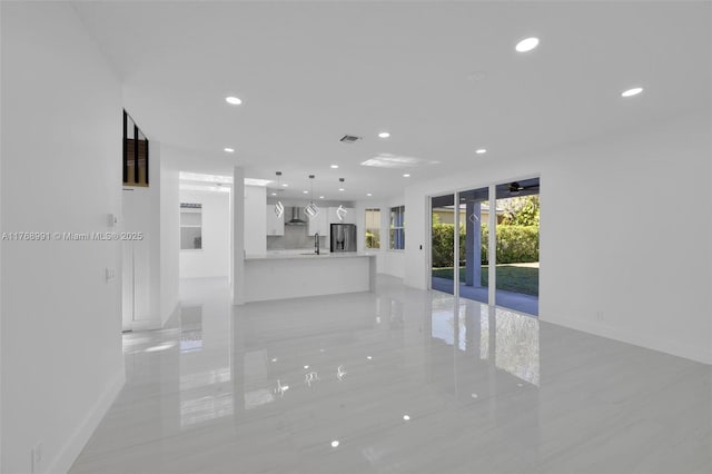 1170 Chenille Cir, Weston, FL 33327 - unfurnished living room with recessed lighting, a sink, baseboards, light tile patterned floors, and ceiling fan