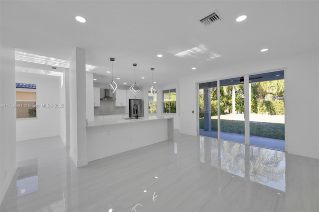 1170 Chenille Cir, Weston, FL 33327 - unfurnished living room with recessed lighting, baseboards, and a sink