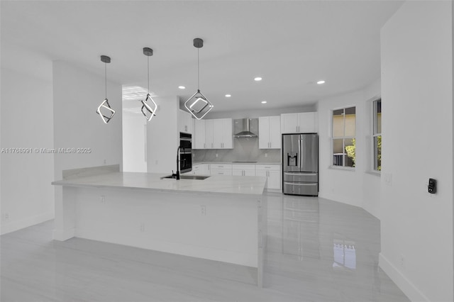 1170 Chenille Cir, Weston, FL 33327 - kitchen featuring appliances with stainless steel finishes, baseboards, wall chimney exhaust hood, white cabinetry, and recessed lighting