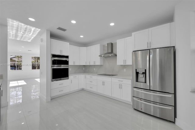 1170 Chenille Cir, Weston, FL 33327 - kitchen with appliances with stainless steel finishes, wall chimney exhaust hood, white cabinets, light countertops, and decorative backsplash