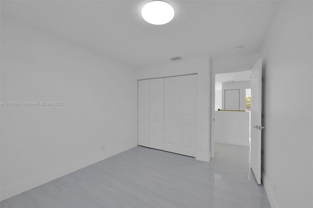 1170 Chenille Cir, Weston, FL 33327 - unfurnished bedroom with a closet and baseboards