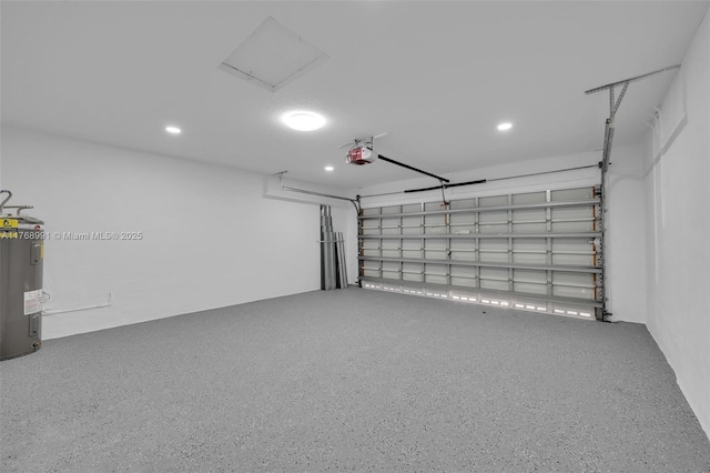 1170 Chenille Cir, Weston, FL 33327 - garage featuring a garage door opener, water heater, and recessed lighting