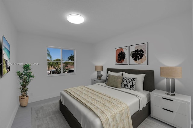 1170 Chenille Cir, Weston, FL 33327 - bedroom with baseboards and light wood-style flooring