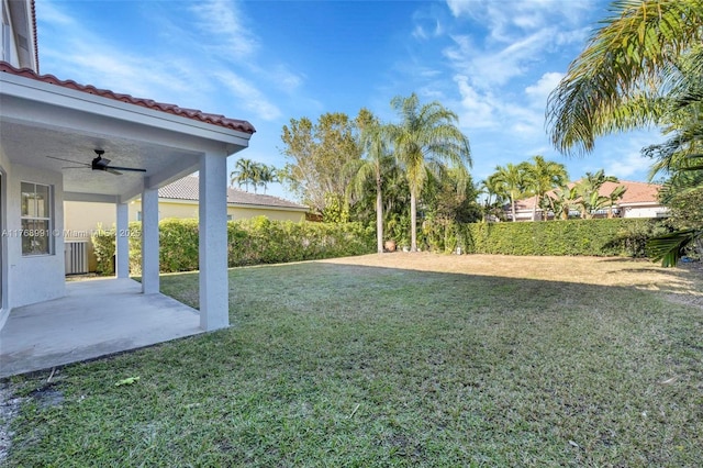 1170 Chenille Cir, Weston, FL 33327 - view of grassy yard featuring a ceiling fan and a patio